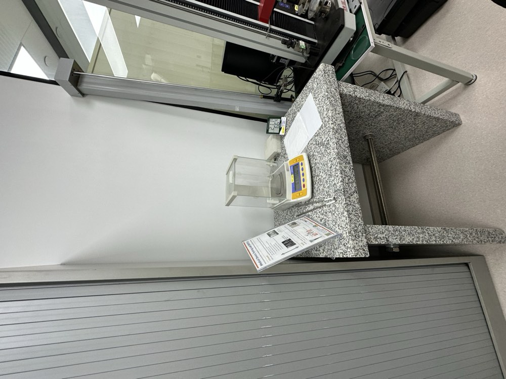 Analytical balance on a granite table